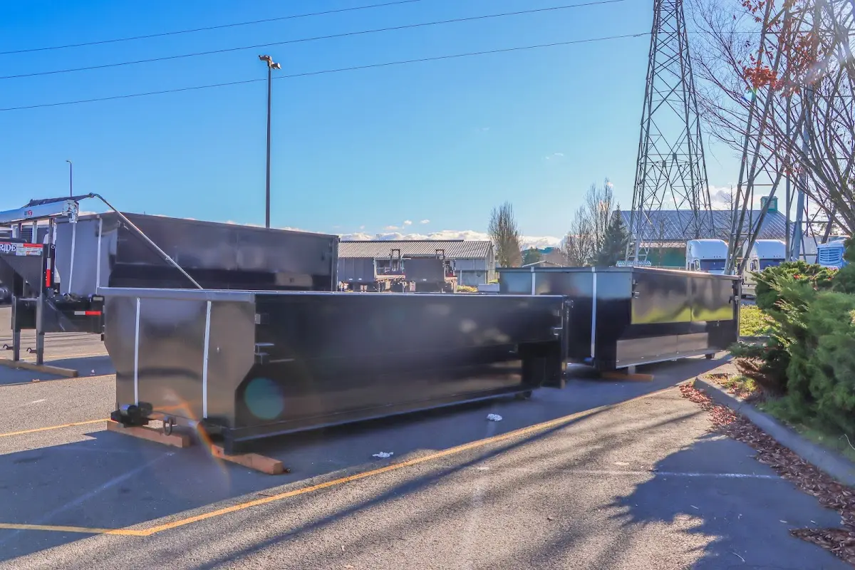 Roll-off dumpster ready for waste disposal at job site for Roofing Dumpster Rental in Oakmont